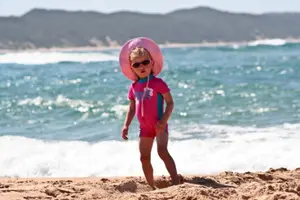 LITTLE GIRL ON THE BEACH
