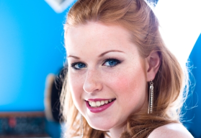 history of skin cancer redhead girl smiling